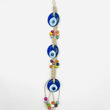 Load image into Gallery viewer, Triple Evil Eye Rope Wall Hanging: Elegant Protection
