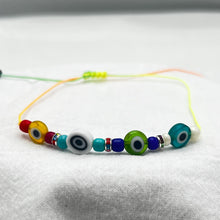 Load image into Gallery viewer, Rainbow Rope Evil Eye Beaded Bracelet Set of 12 - Protection
